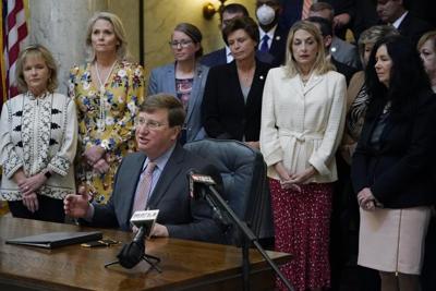 Mississippi governor signs law restricting transgender people's use of bathrooms and locker rooms