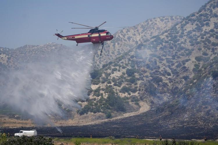 Strong winds, steep terrain hamper crews battling Los Angeles area's first major fire of the year