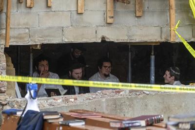 FACT FOCUS: Discovery of a tunnel at a Chabad synagogue spurs false claims and conspiracy theories