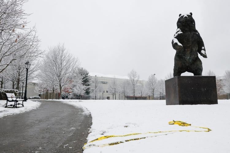 Person of interest detained in Brown University shooting that killed 2 and wounded 9