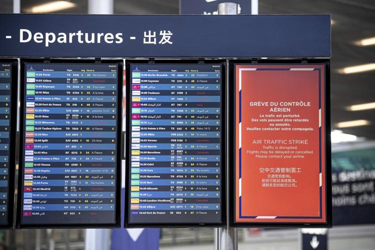 A strike by air traffic controllers is disrupting travel to, from and over France