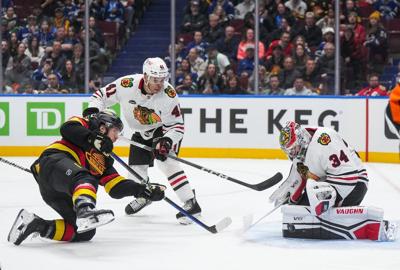 Jets acquire Phillips from Blackhawks for Kuzmin in swap of defencemen