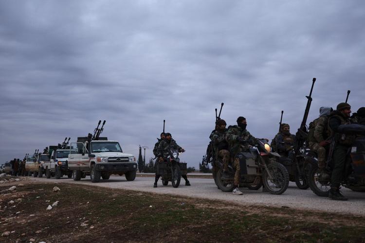 Syrian government forces enter northern towns after Kurdish fighters withdraw
