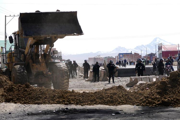 Bolivia’s president declares a state of emergency as road blockades choke supplies