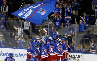 NHL roundup: Rangers tip Islanders 3-2 in SO, record franchise-best 54th win