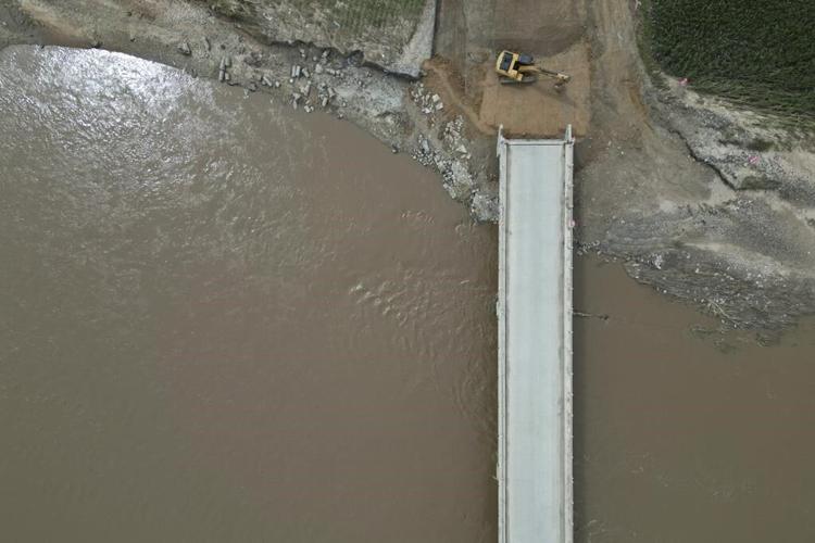 China's Xi calls for measures to mitigate disastrous flooding amid economic slowdown