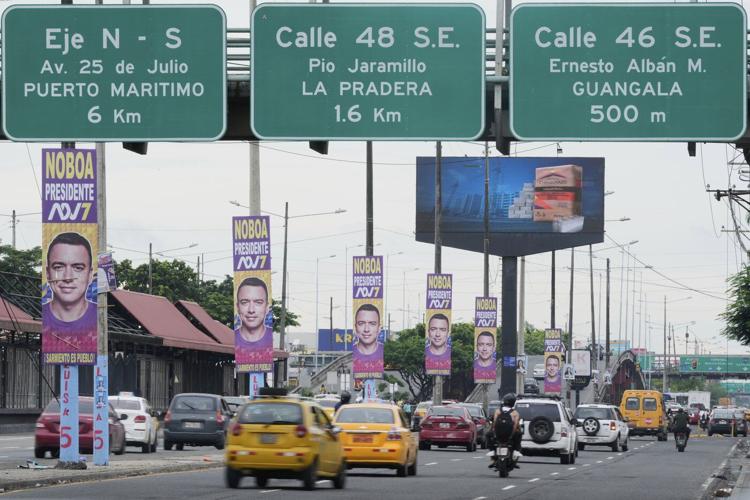 Polls open in Ecuador's presidential runoff as voters choose between incumbent and a leftist lawyer