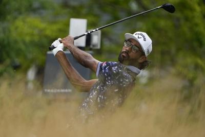 Tom Kim builds a 2-shot lead over Scheffler and Morikawa at Travelers Championship