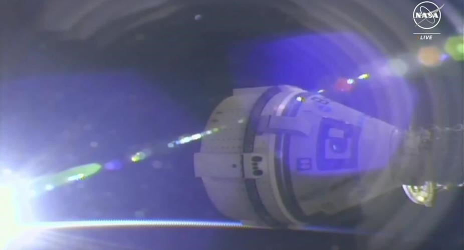 Boeing's astronaut capsule arrives at the space station after thruster trouble