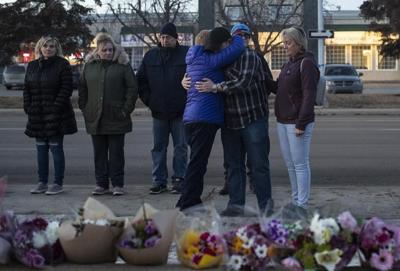 Slain officers' families issue statements thanking public for support