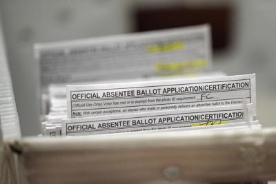 Judge dismisses lawsuit challenging absentee voting procedure in battleground Wisconsin