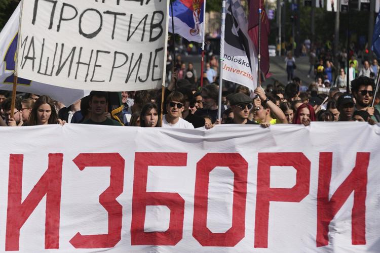 Thousands rally in Serbia's capital demanding snap elections after months of protests
