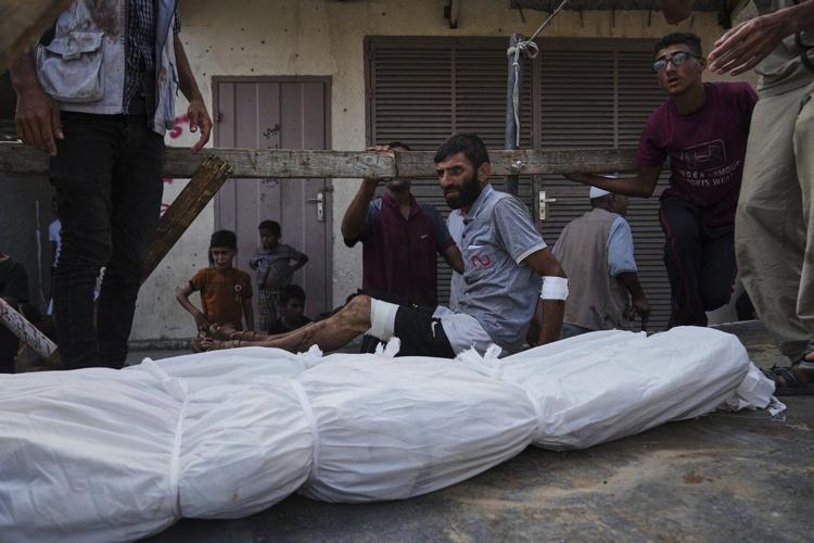 UN food agency says Israeli tanks and snipers opened fire on a crowd seeking aid in Gaza