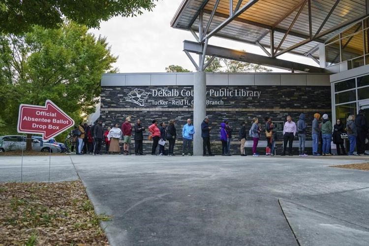 Georgians flock to cast ballots as early in-person voting begins