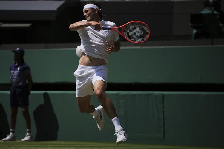Wimbledon: Taylor Fritz beats Karen Khachanov for his first semifinal at the grass-court Slam