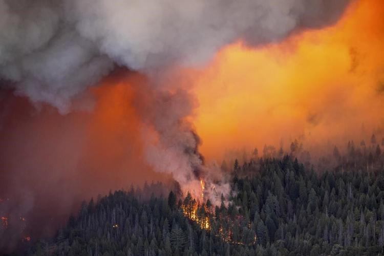California fire scorches through land the size of Los Angeles as blazes burn across US West