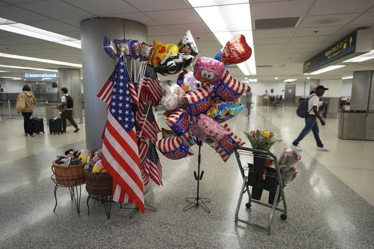 Trump's new travel ban takes effect as tensions escalate over immigration enforcement