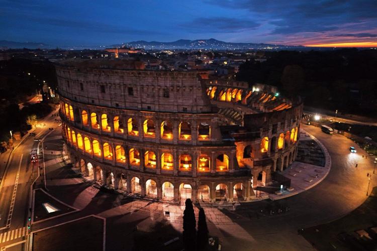 Photos offer stunning aerial views of Rome’s Colosseum and ancient Forum