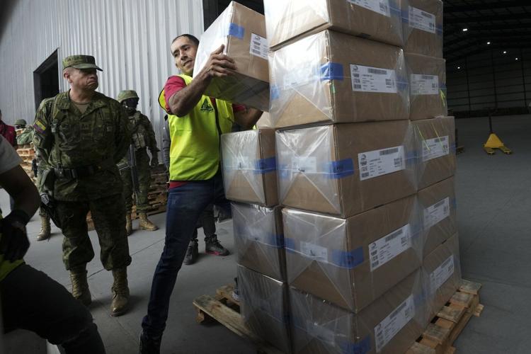 Polls open in Ecuador with conservative incumbent and leftist lawyer leading the presidential race