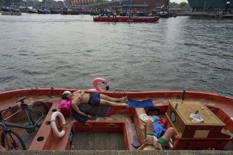 Surrounded by water, Dutch swimmers have plenty of places to cool off