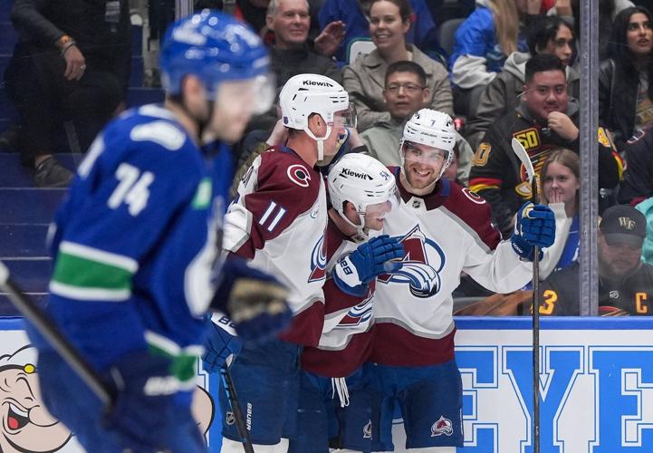 MacKinnon nets 5 points as Avalanche beat Canucks 5-4 in overtime