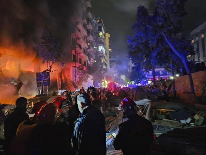 An Israeli strike in Beirut kills Hezbollah's spokesman, while a strike in Gaza kills at least 30