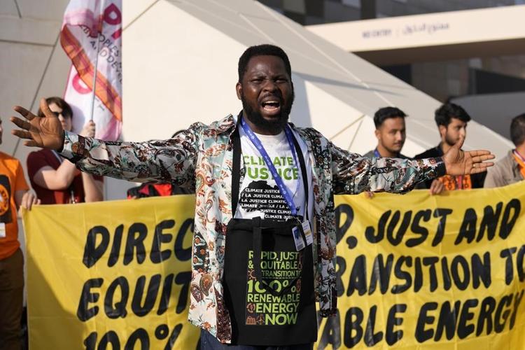 Activists at COP28 summit ramp up pressure on cutting fossil fuels as talks turn to clean energy