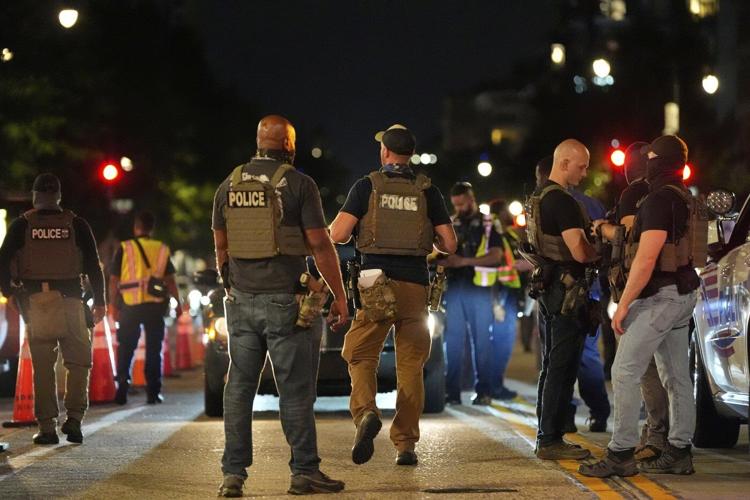 The Latest: Federal agents will patrol Washington 24/7