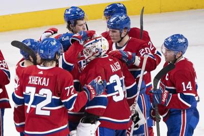 Suzuki and Dach star in shootout as Canadiens rally past Flames 2-1