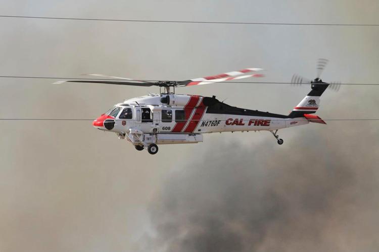 Evacuations ordered as winds pose challenges for firefighters battling California blaze