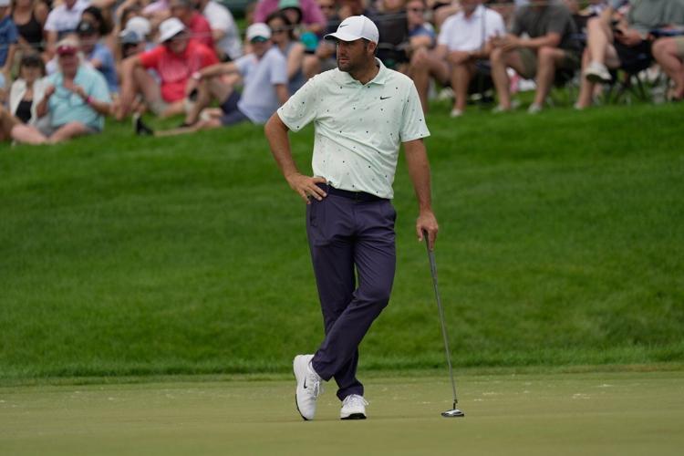 J.T. Poston handles the wind at Memorial for low round of tournament and the lead