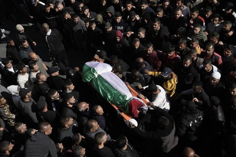 Palestinians say Israeli troops kill 9 in West Bank raid