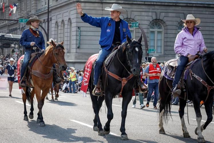 'Don't fall off the horse': Astronaut Jeremy Hansen leads Calgary Stampede parade