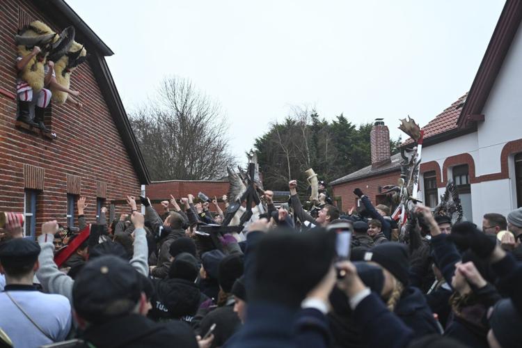 German island festival passes peacefully after criticism over practice of men hitting women