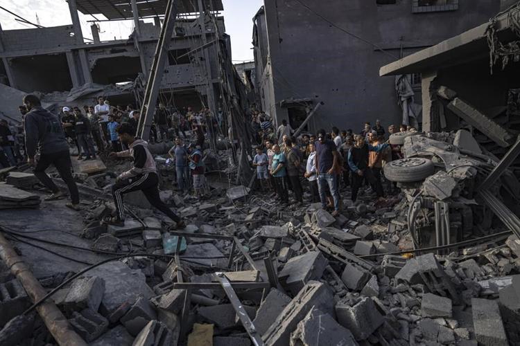 Gaza has lost telecom contact again, while Israel's military says it has surrounded Gaza City