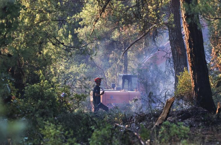 Torrential rainstorms batter Romania as Turkey and Albania battle wildfires