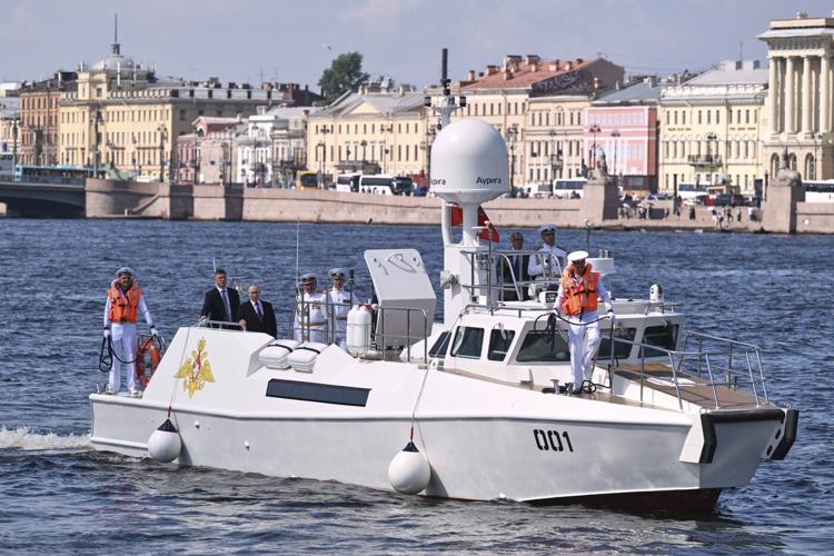 Russia scales down celebrations honoring its navy as Ukraine launches more drone attacks