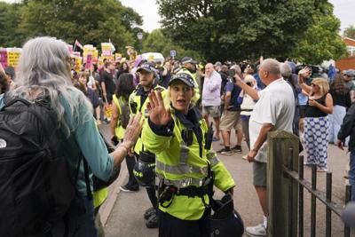 Officials win court case to remove asylum-seekers from a UK hotel that's been the focus of protests