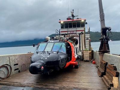US Coast Guard helicopter that crashed during rescue mission in Alaska is recovered