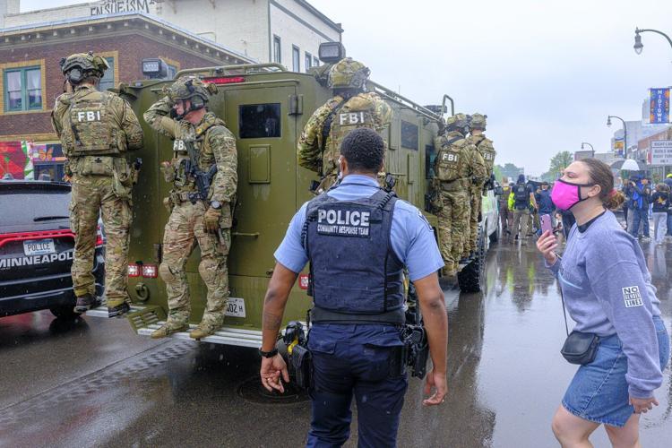 Federal officers in tactical gear went into a Latino community in Minneapolis. A protest followed
