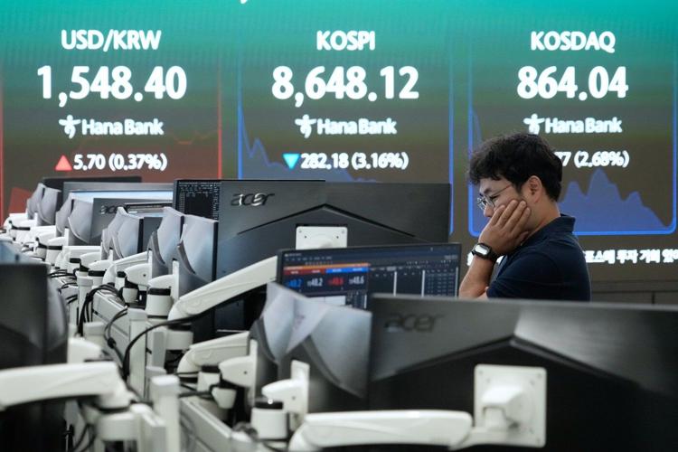Asian shares plunge as traders sell to lock in profits after recent rallies driven by AI