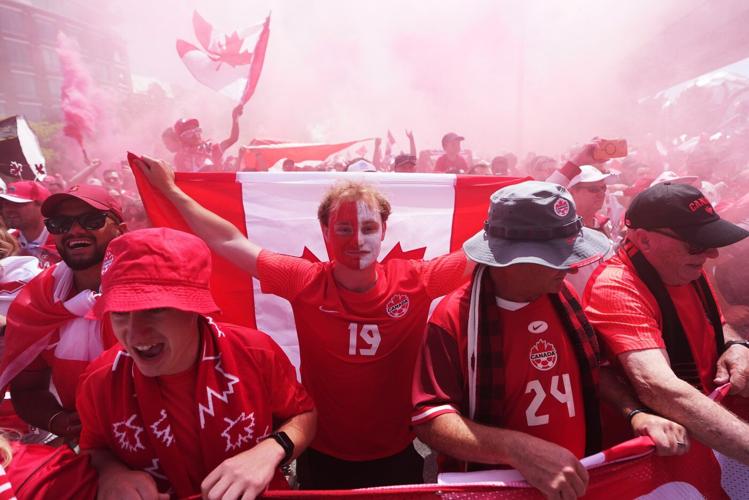 Canada's World Cup fans in Vancouver paint the town red