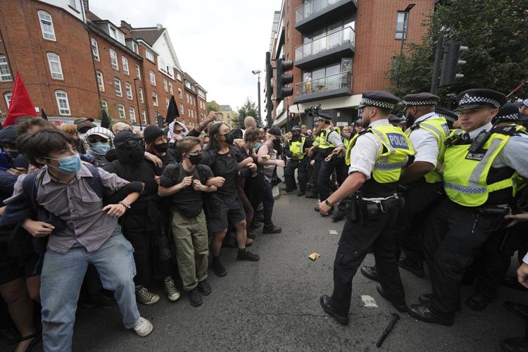 Rival anti-migrant and anti-racism protests face off outside a hotel housing migrants in London