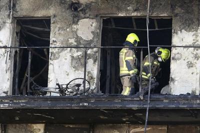 Forensic police find a 10th body in the charred remnants of a Spanish apartment building