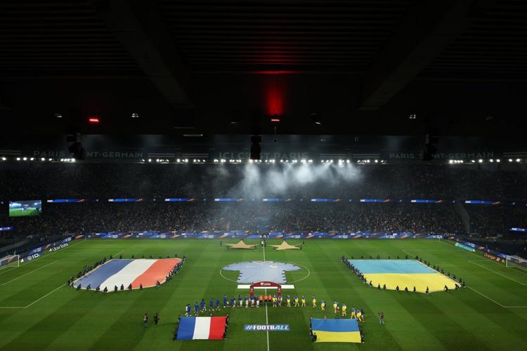 Players and fans remember victims of 2015 Paris terror attacks before France-Ukraine soccer match