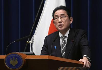 Kishida says he regrets a ruling party funds scandal and will work on partial changes to his Cabinet