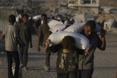 Foreign ministers call on Israel to ensure international aid groups can work in Gaza