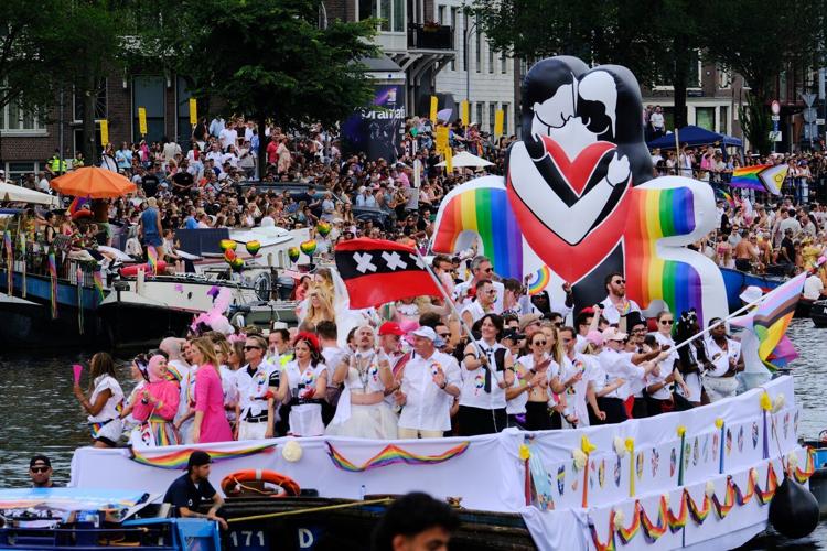 Hundreds of thousands line Amsterdam canals for the annual Pride boat parade