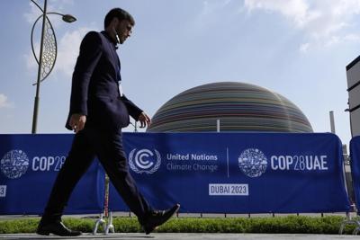 As fossil fuel execs descend on U.N. climate summit, some ask 'what are COPs about?'