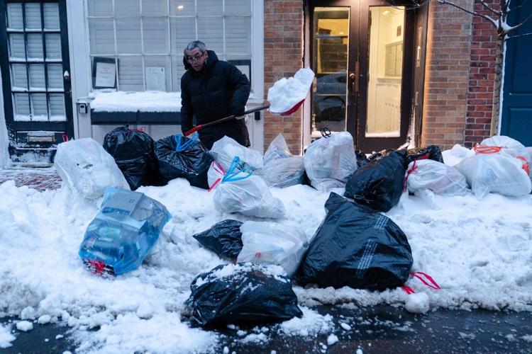 Northeast US scrambles to clear piles of snow as new storm descends on the region
